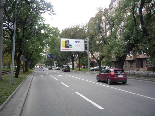 Щит 6x3,  ул. Челюскинцев, 263 - перед ул. Молодых Шахтеров (ТЦ "Атлант")