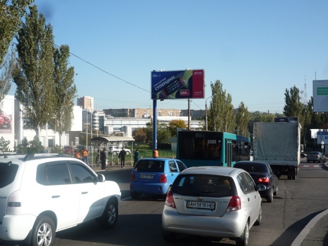 Щит 6x3,  ул. Кирова (остановка, мариуп. развилка, автосалон "Мазда")